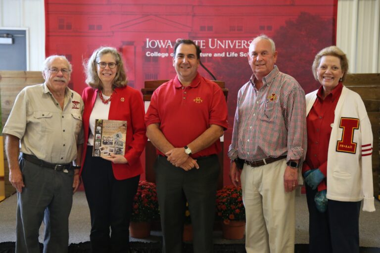 AAEA Members Present Anniversary Book to University President, Dean