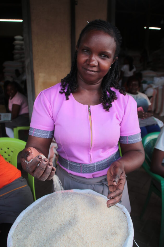 Woman selling rice.